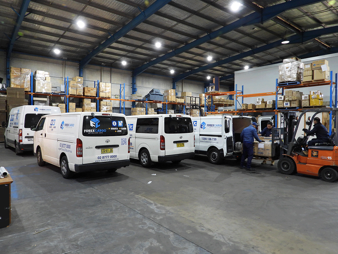 Forex Cargo vans and a forklift inside the warehouse